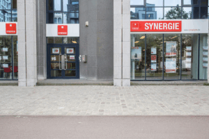 De bedrijfsnaam is Synergie Antwerpen Interim