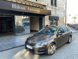 De bedrijfsnaam is taxi en taxibusje Antwerpen assistentie
